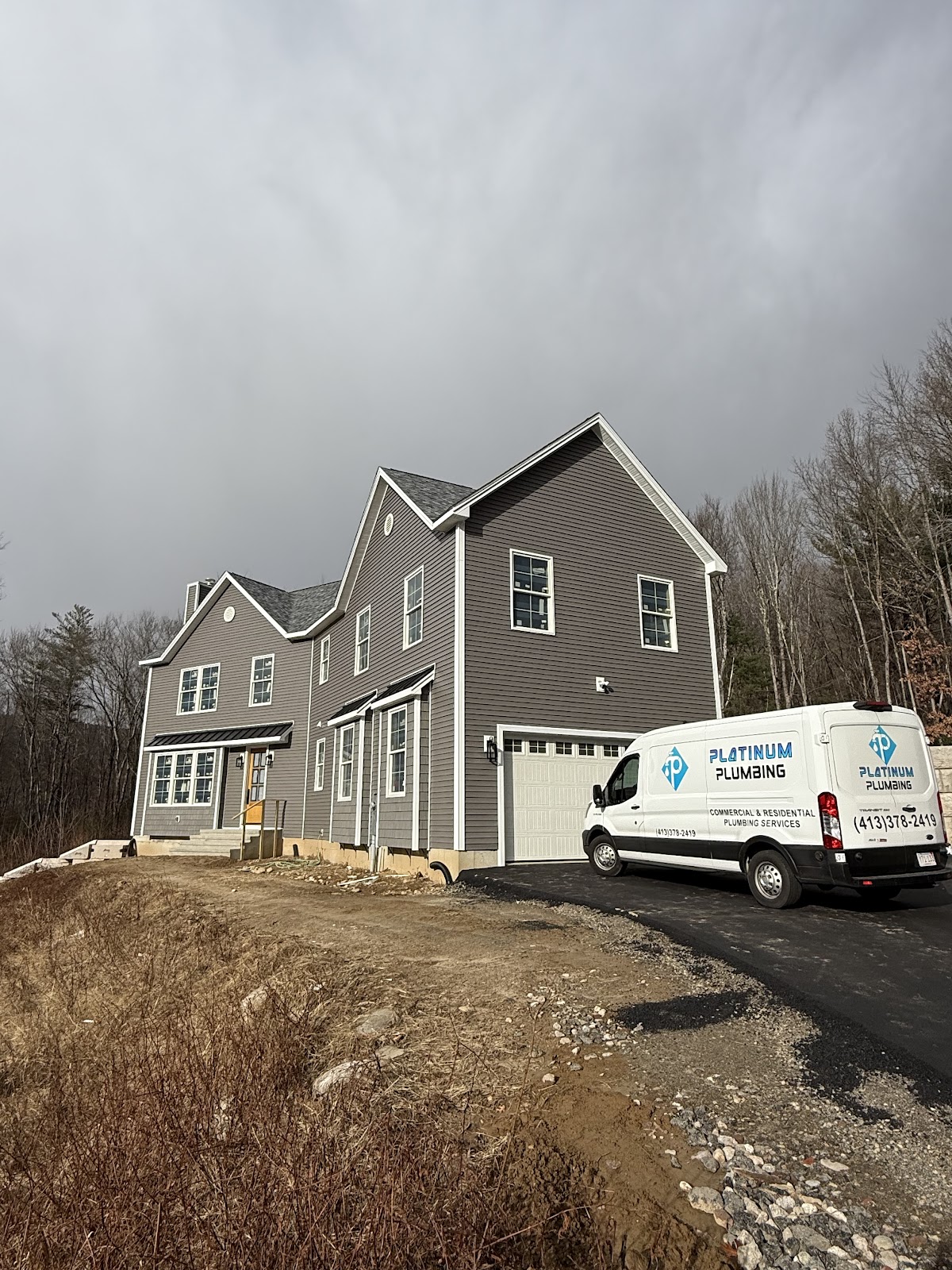Platinum Plumbing van parked at a new construction house near West Springfield, MA